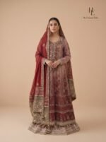 A regal crimson bridal with intricate antique gold craftsmanship - Image 2