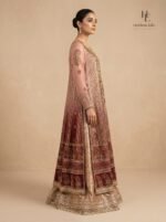 A regal crimson bridal with intricate antique gold craftsmanship - Image 5
