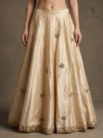 Chikankari blouse paired with a fluid champagne-gold lehenga - Image 2