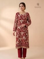 Deep crimson ensemble adorned with exquisite handcrafted gota work - side view