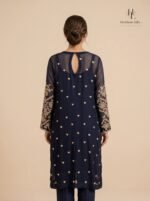 Navy blue formal by Roohèrang featuring intricate silver-gold floral embroidery on a rich sheer silhouette - Image 4