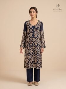 Navy blue formal by Roohèrang featuring intricate silver-gold floral embroidery on a rich shirt design